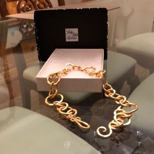 Saks Fifth Avenue brush gold necklace.